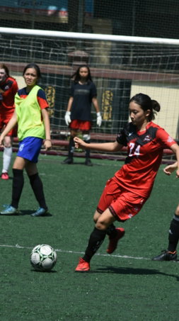 girls playing soccer